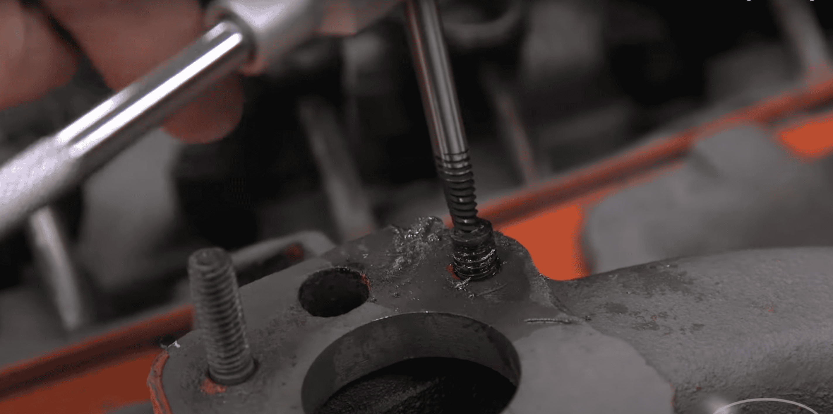 Extract the bolt with screw extractors